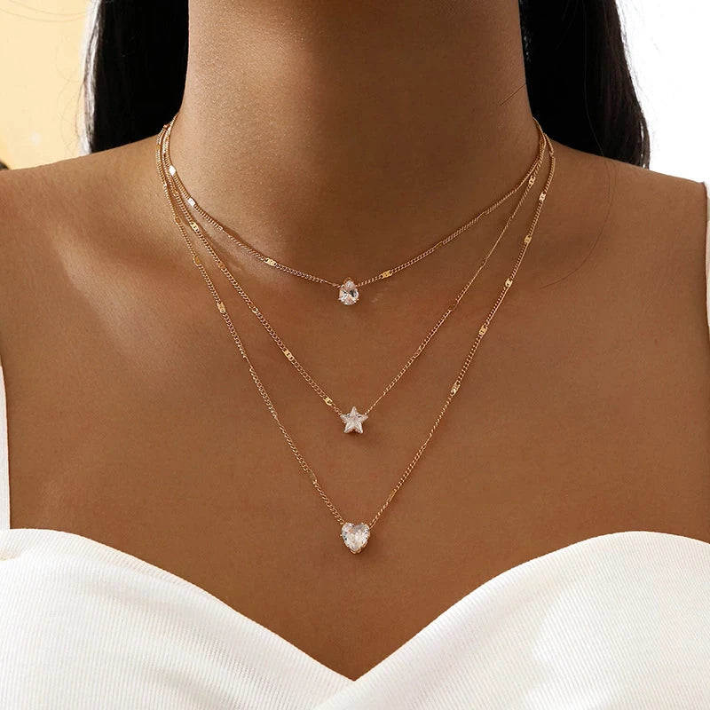 Necklace with three pendants featuring gold-plated cubic zirconia