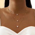 Necklace with three pendants featuring gold-plated cubic zirconia