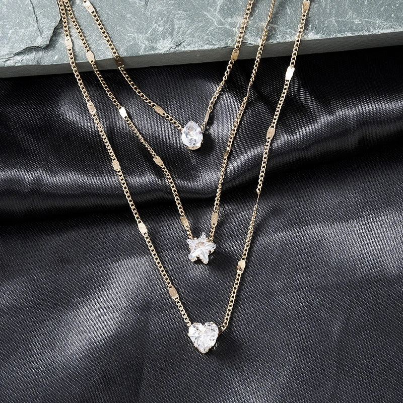Necklace with three pendants featuring gold-plated cubic zirconia