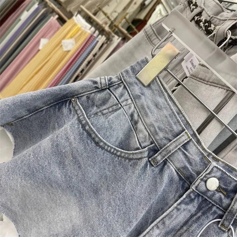 Shorts de mezclilla con ribete de encaje para mujer