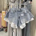 Shorts de mezclilla con ribete de encaje para mujer