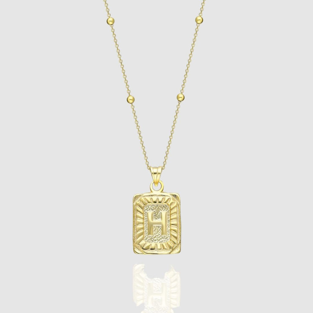 Collar con medallón de inicial