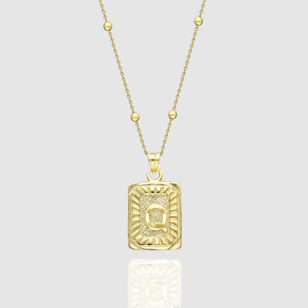 Collar con medallón de inicial