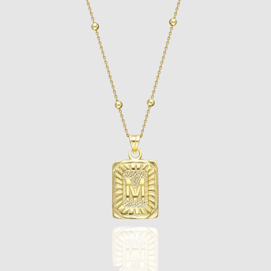 Collar con medallón de inicial