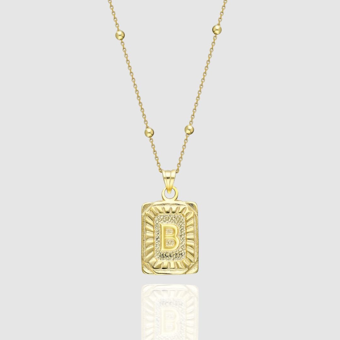 Collar con medallón de inicial
