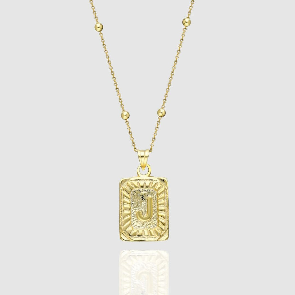 Collar con medallón de inicial