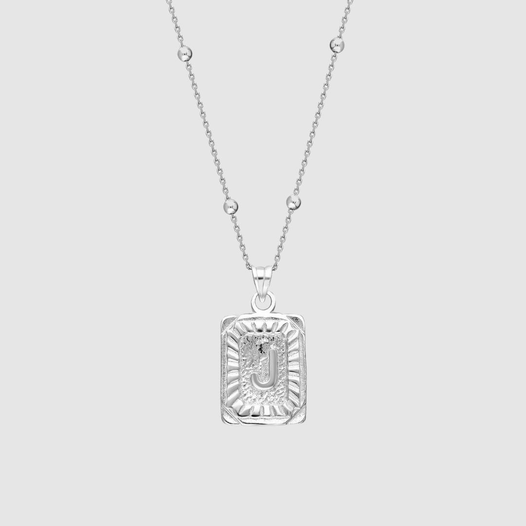 Collar con medallón de inicial