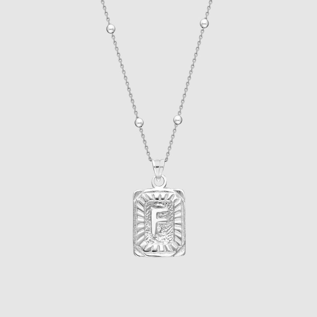 Collar con medallón de inicial