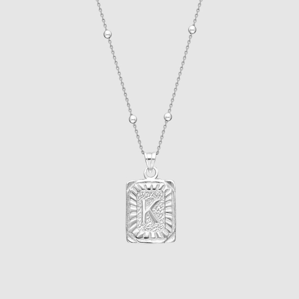 Collar con medallón de inicial