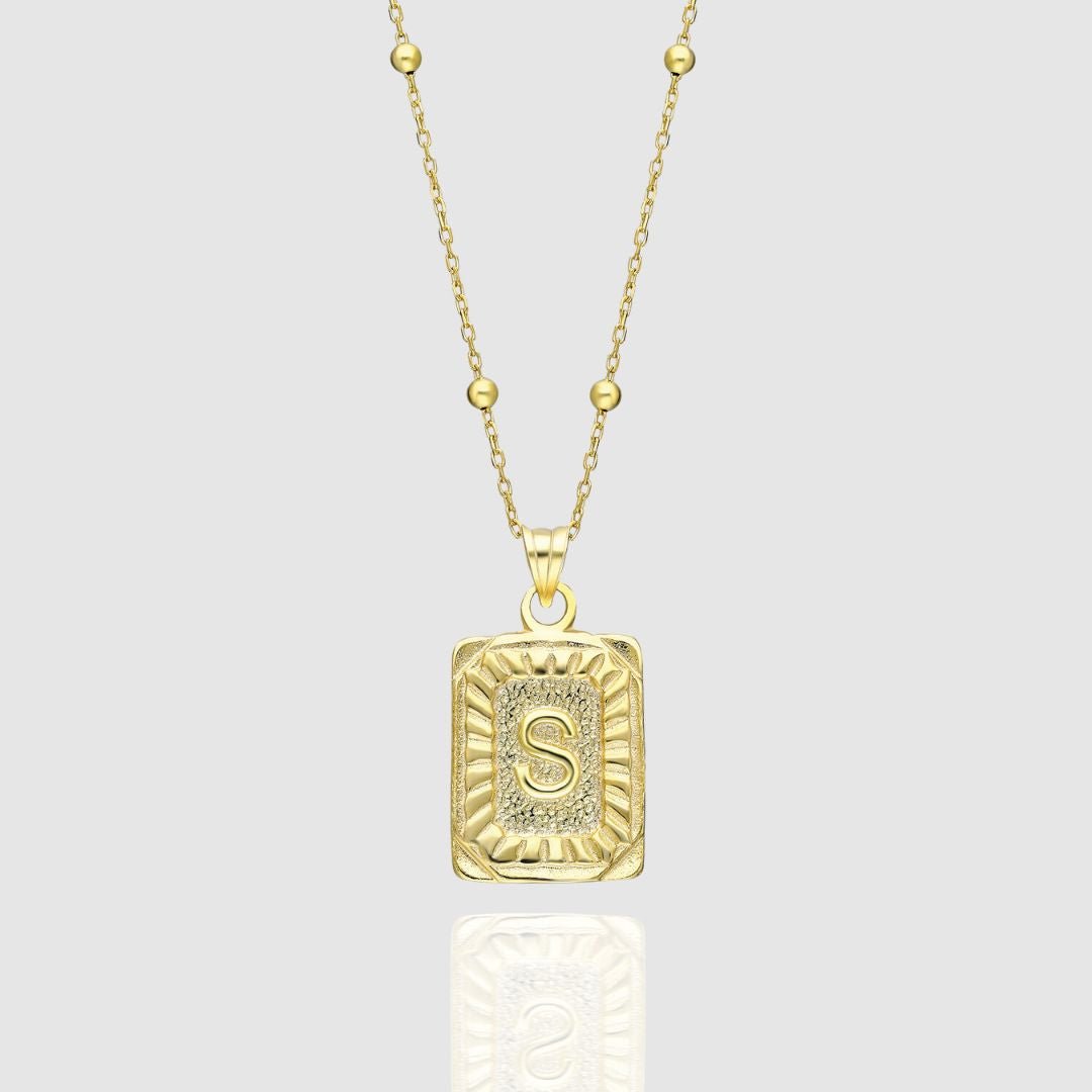 Collar con medallón de inicial
