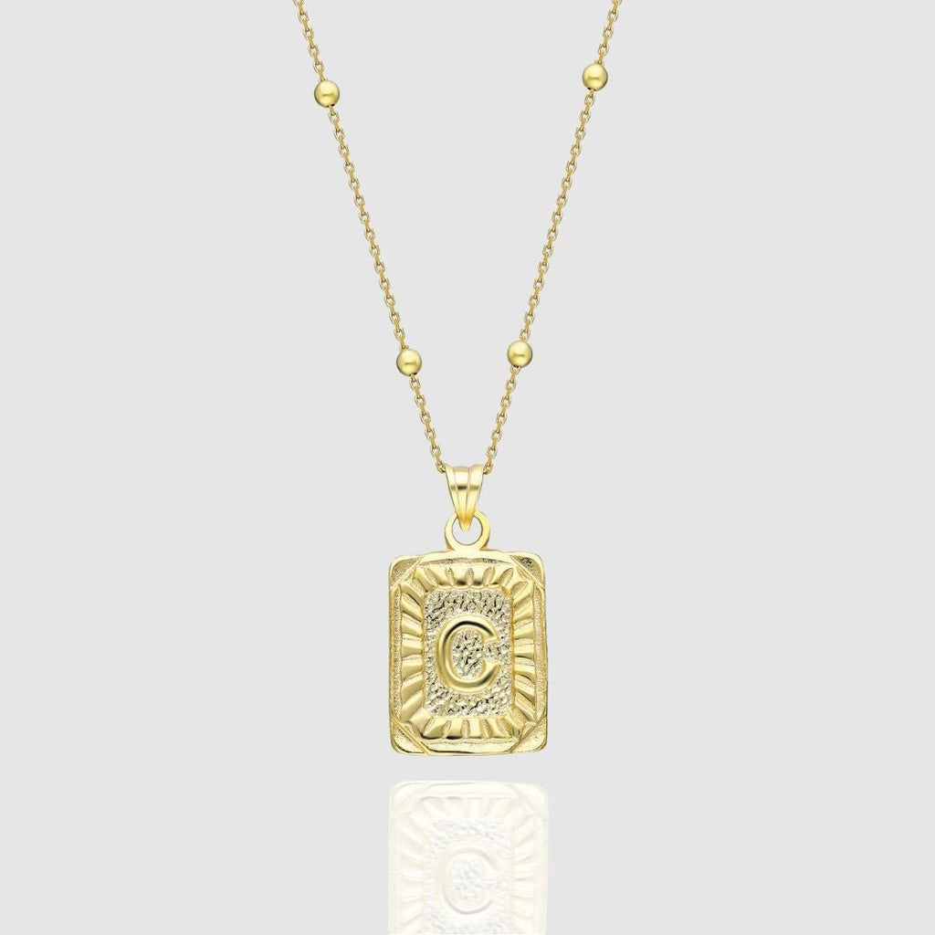 Collar con medallón de inicial
