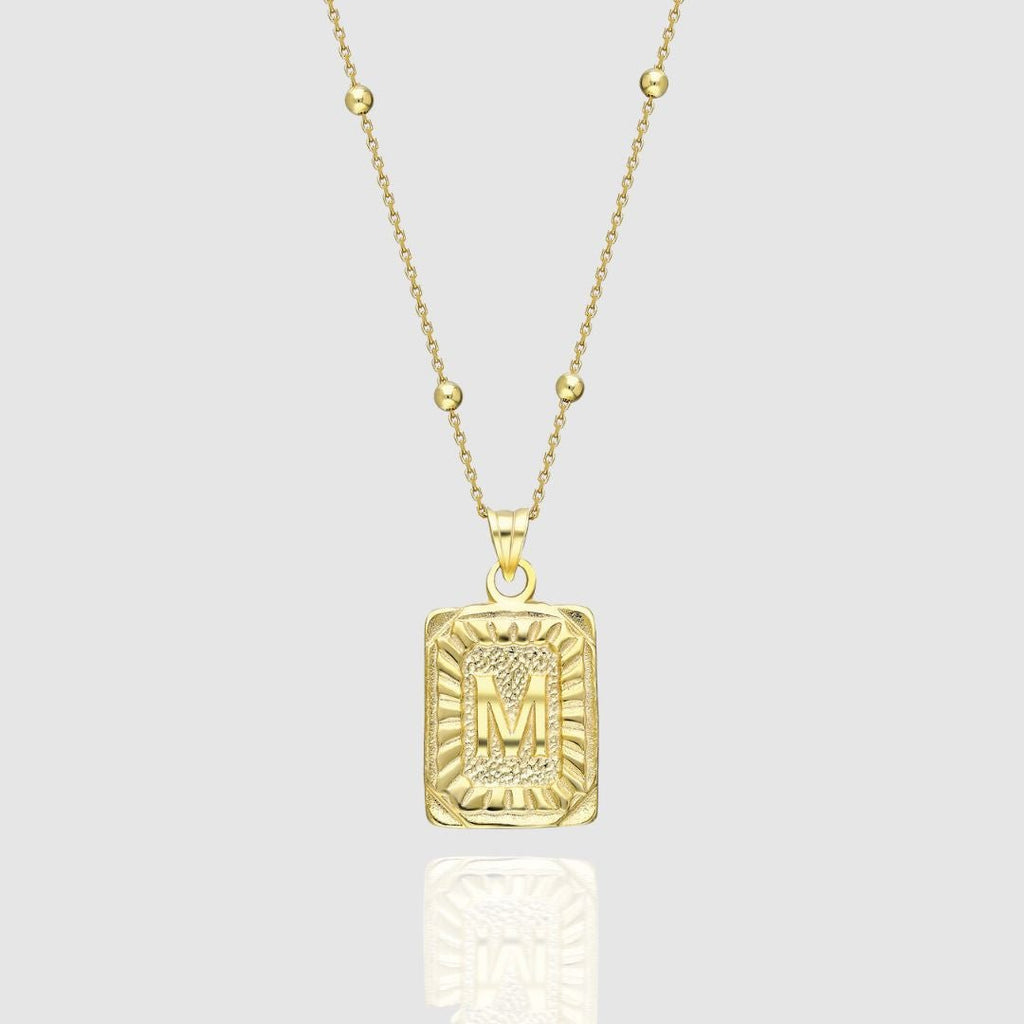 Collar con medallón de inicial