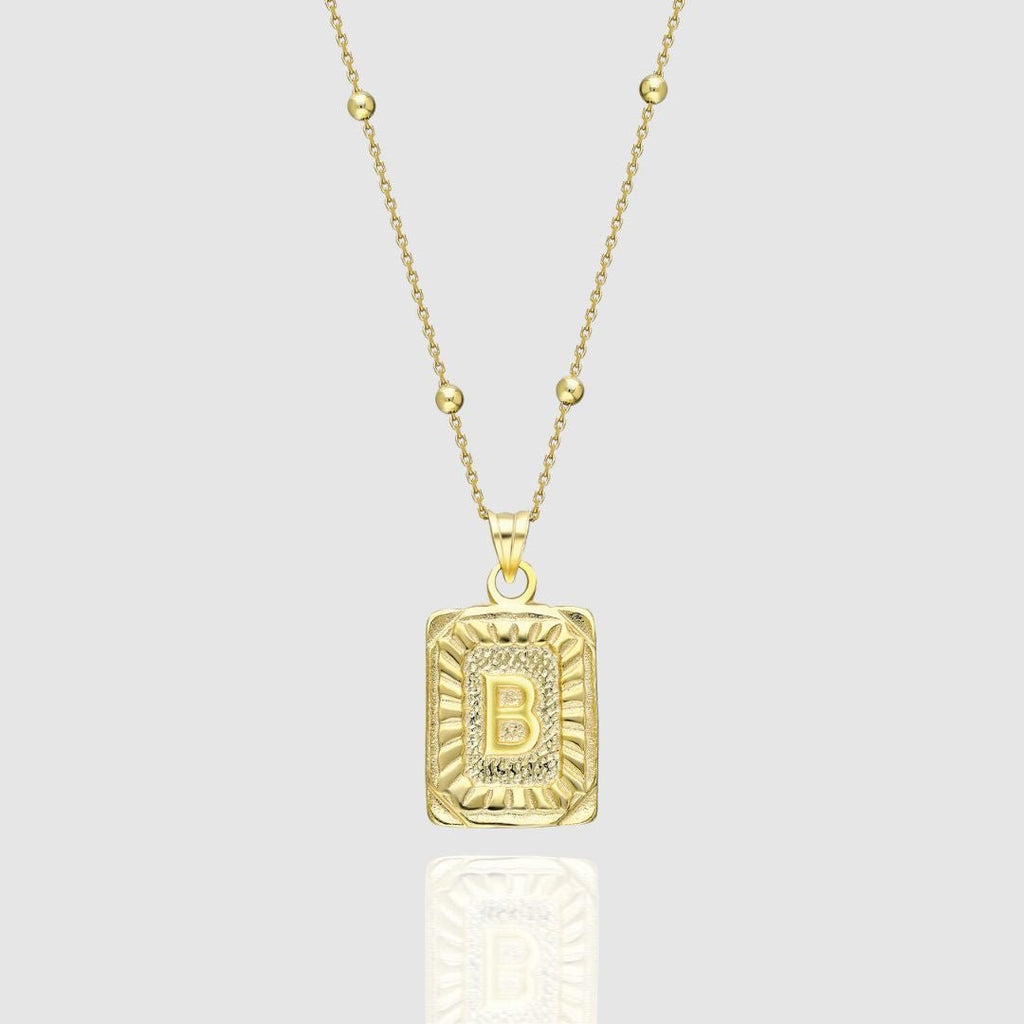 Collar con medallón de inicial