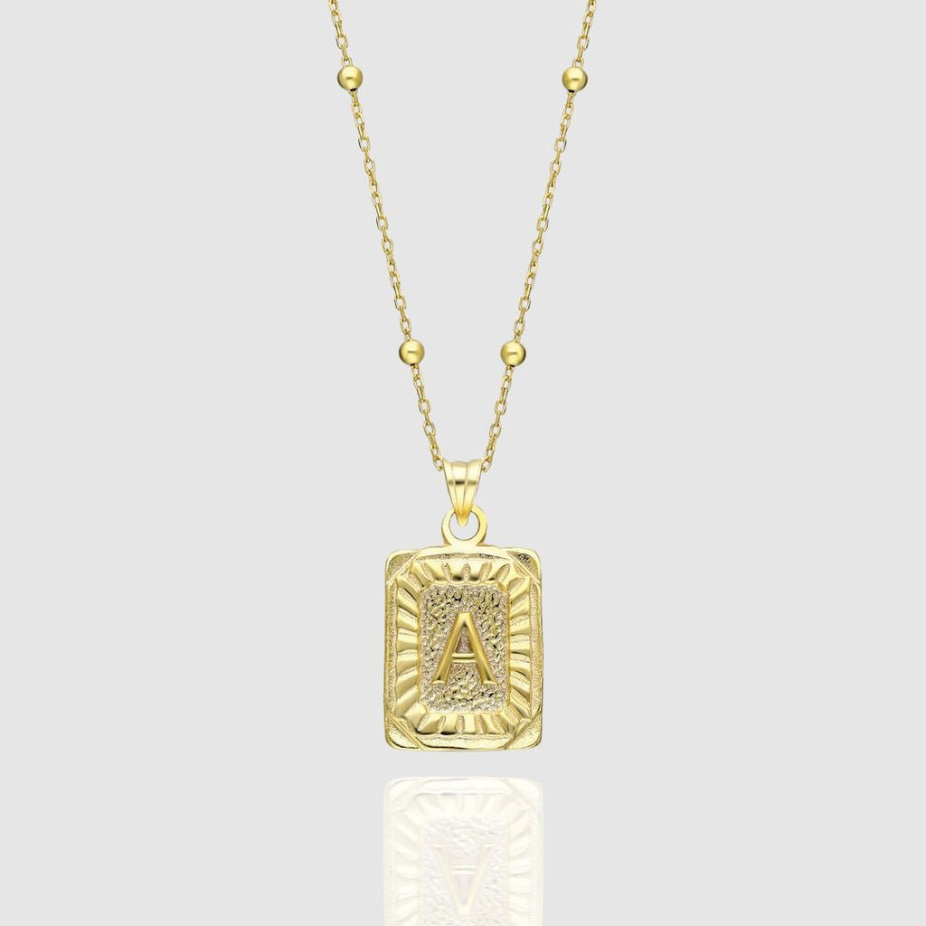 Collar con medallón de inicial