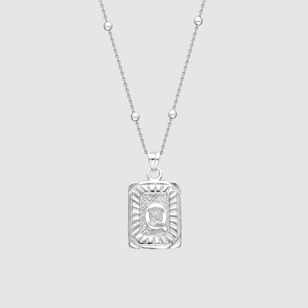 Collar con medallón de inicial