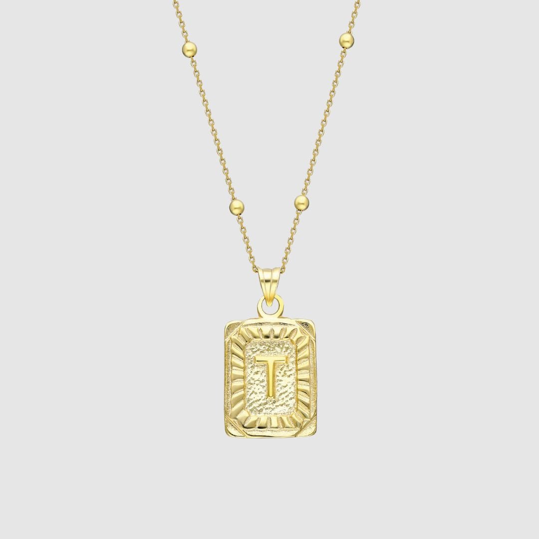 Collar con medallón de inicial