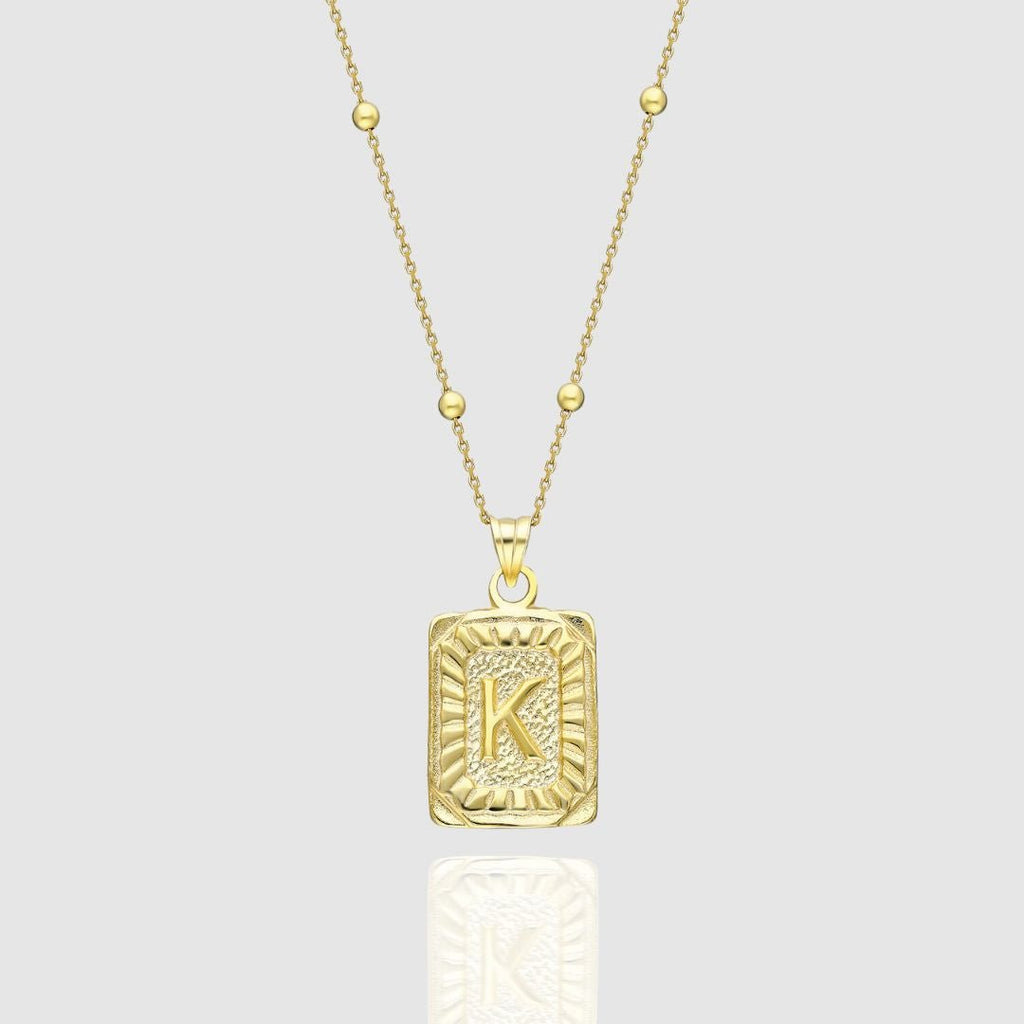 Collar con medallón de inicial