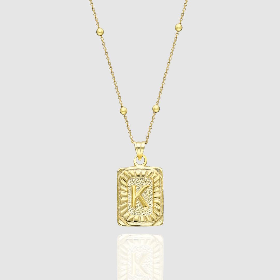 Collar con medallón de inicial