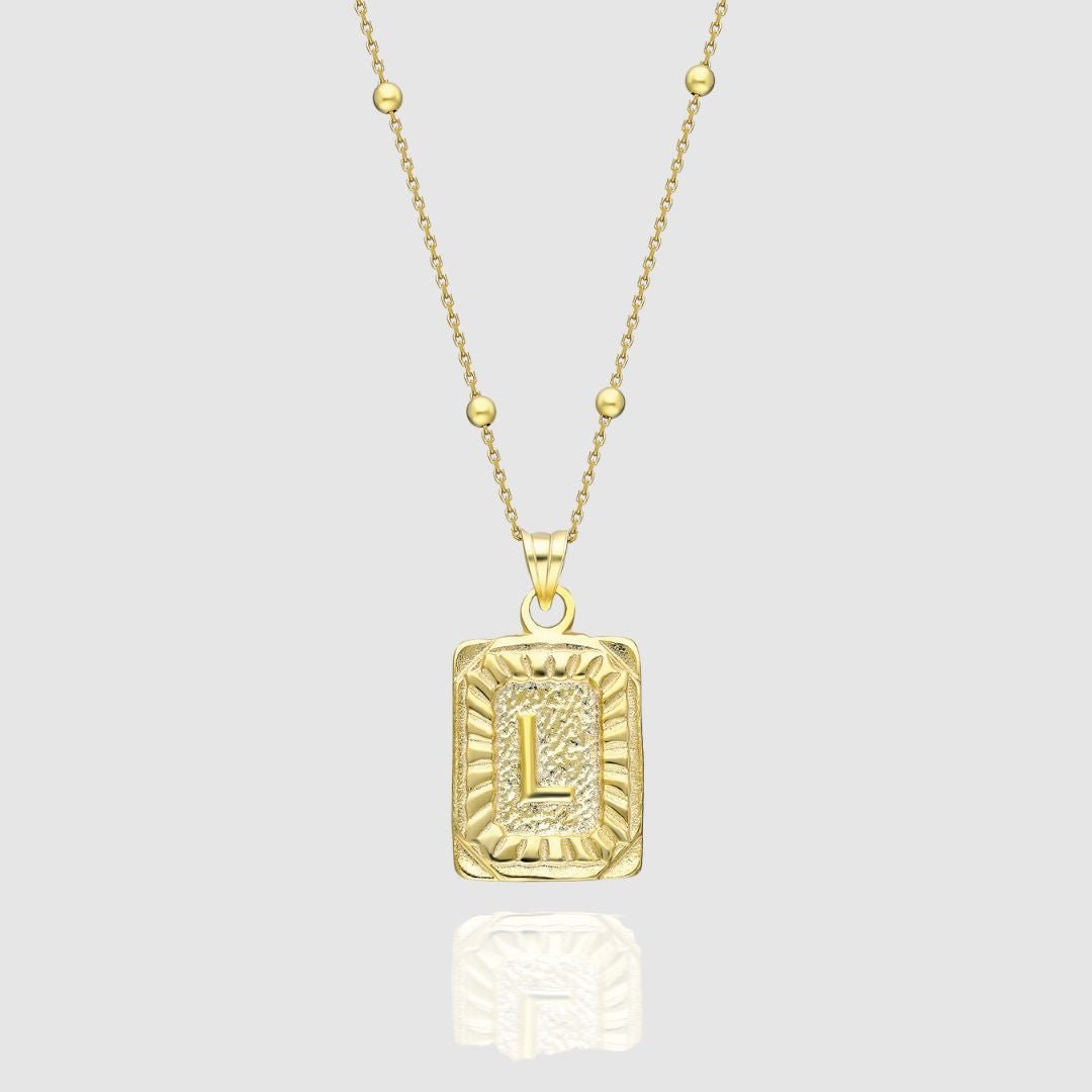Collar con medallón de inicial