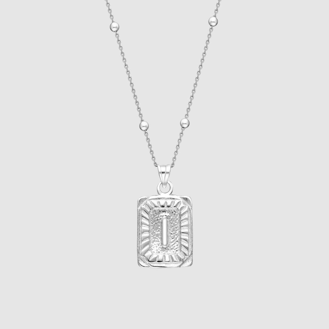 Collar con medallón de inicial
