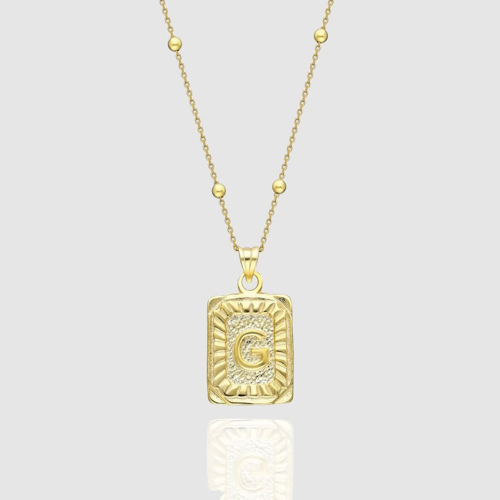 Collar con medallón de inicial