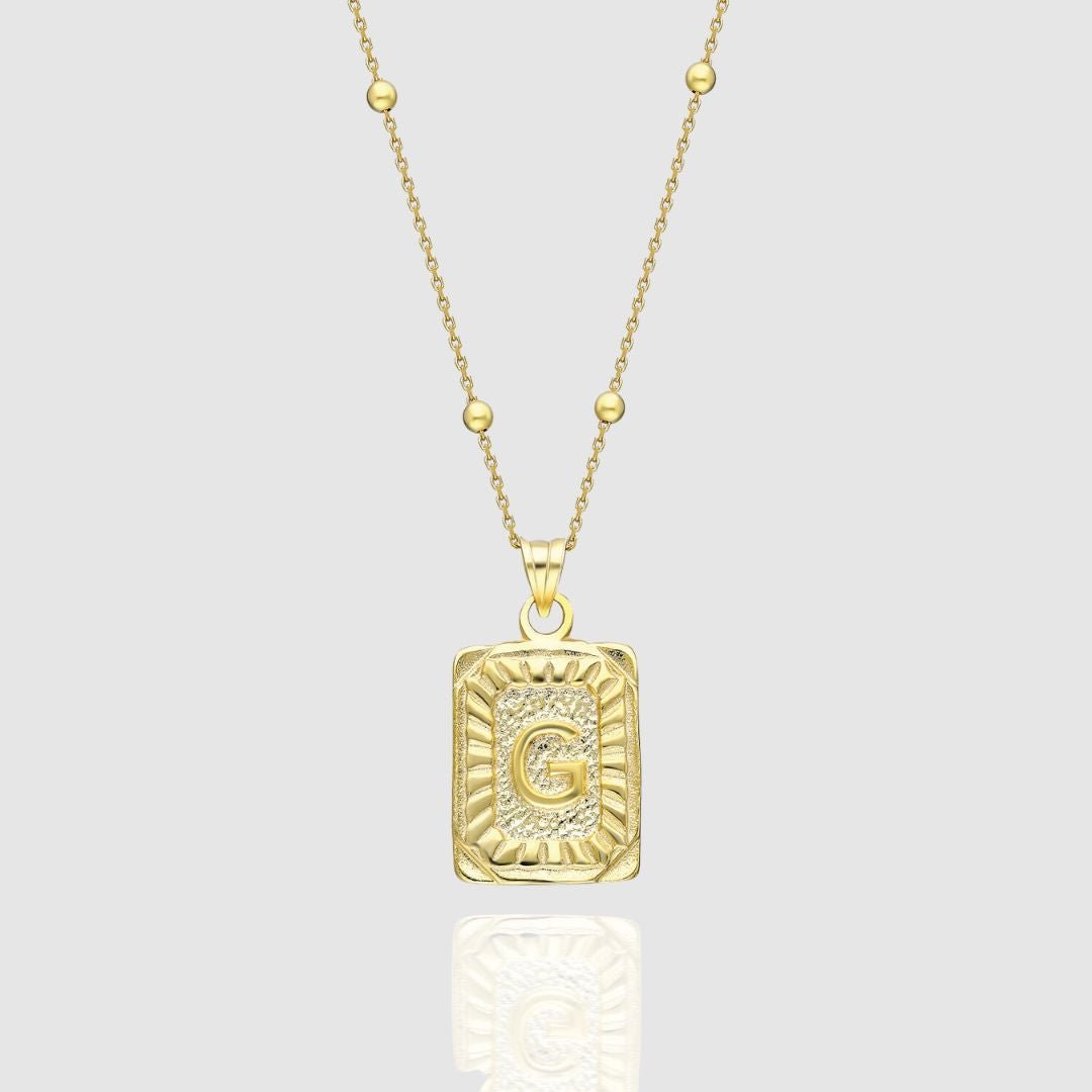 Collar con medallón de inicial